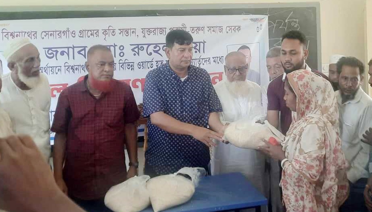 বিশ্বনাথে প্রবাসী রুহেল মিয়ার পক্ষ থেকে ত্রাণ পেলেন বন্যার্তরা